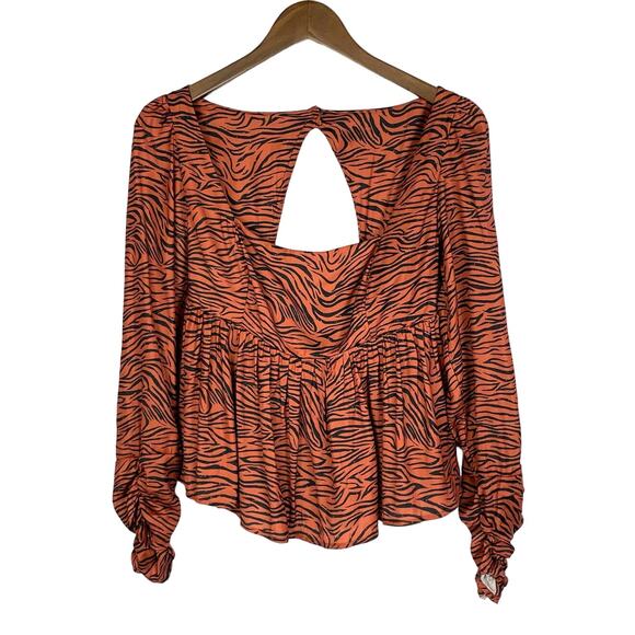 Free People | Tiger Open Back Cut-Out Flouncy Peplum Smocked Long Sleeve Top - Picture 3 of 11